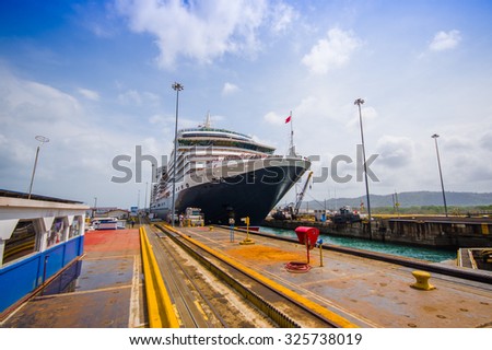 COLON, PANAMA - APRIL 15, 2015: SHip enters the Gatun Locks in the Panama Canal. This is the first set of locks situated on the Atlantic entrance of the Panama Canal.