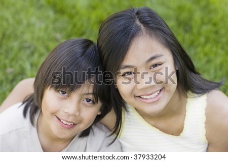 Close Up Portrait of Asian Brother and Sister