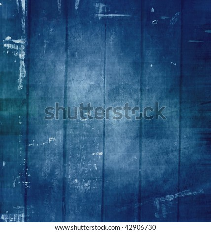 Old grunge scratched texture, dark blue background.