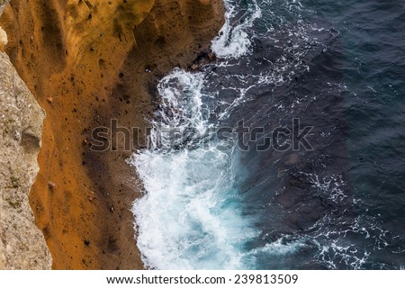 Abstract background - stormy sea meets rocks.