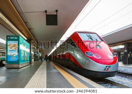NAPLES, ITALY - NOVEMBER 30, 2014: Napoli Centrale railway station. Freccia Rossa bullet train 300 km/h.