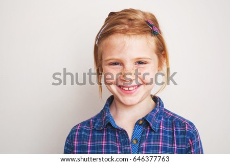 Similar – Image, Stock Photo Cute redhead little girl looking at us and smiling