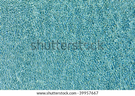 rippled pattern of blue swimming pool water