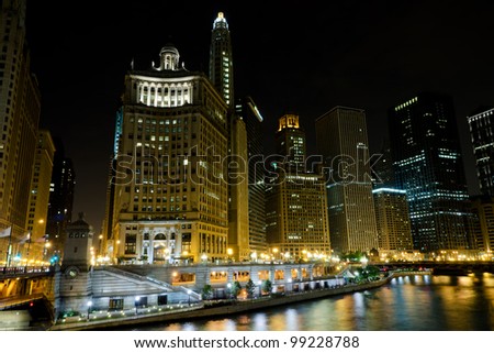 Downtown Chicago by night from river bank