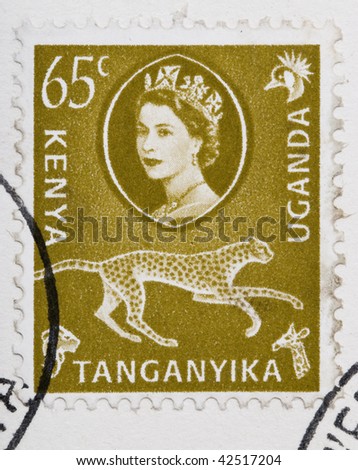 CIRCA 1960: A stamp printed in East Africa from a first day cover of an animal and plant series  showing an image of a running cheetah, circa 1960.