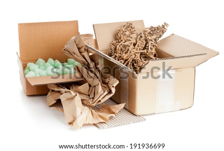 Heap of recyclable packaging materials - cardboard, paper, cornstarch pellets