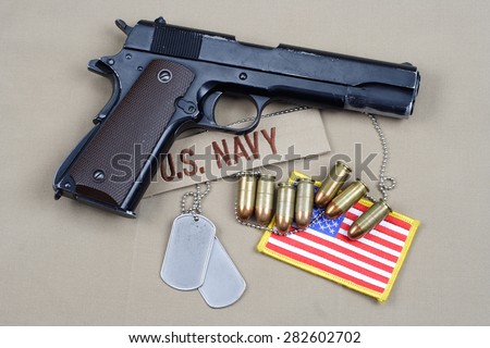 handgun on navy uniform