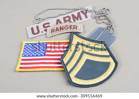 KIEV, UKRAINE - August 21, 2015.  US ARMY Staff Sergeant rank patch, ranger tab, flag patch and dog tag