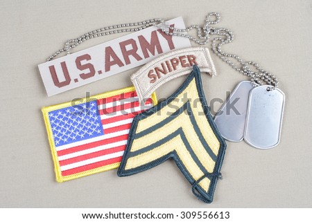 KIEV, UKRAINE - August 21, 2015.  US ARMY Sergeant rank patch, sniper tab, flag patch and dog tag