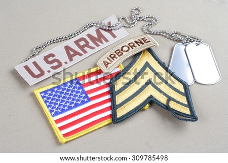 KIEV, UKRAINE - August 21, 2015.  US ARMY Sergeant rank patch, airborne tab, flag patch and dog tag