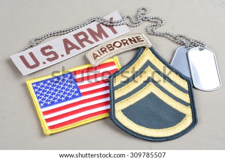 KIEV, UKRAINE - August 21, 2015.  US ARMY Staff Sergeant rank patch, airborne tab, flag patch and dog tag