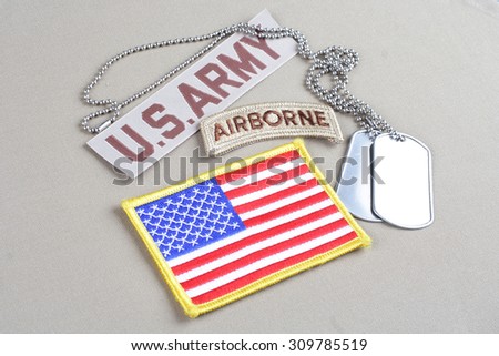 KIEV, UKRAINE - August 21, 2015. US ARMY airborne tab with dog tag and flag patch
