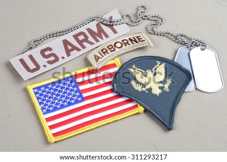 KIEV, UKRAINE - August 21, 2015.  US ARMY Specialist rank patch, airborne tab, flag patch and dog tag