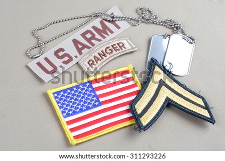 KIEV, UKRAINE - August 21, 2015.  US ARMY Corporal rank patch,  ranger tab, flag patch and dog tag