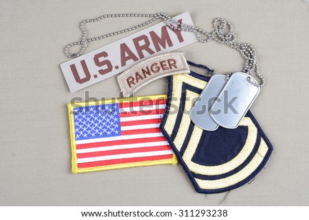 KIEV, UKRAINE - August 21, 2015.  US ARMY Sergeant First Class rank patch, ranger tab, flag patch and dog tag