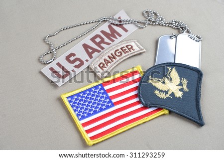 KIEV, UKRAINE - August 21, 2015.  US ARMY Specialist rank patch, ranger tab, flag patch and dog tag