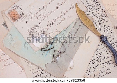 background with old vintage letters and vintage letter opener
