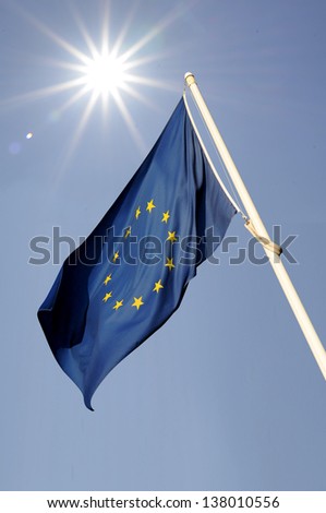 European community full flag with sun and rays