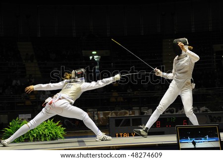 TURIN - FEB 7: Women Foil World Cup,  Valentina Vezzali fight team tournament final match Italy vs Russia on February 7, 2010 in Turin, Italy.