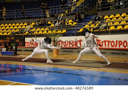 TURIN - FEB 7: Women Foil World Cup, match of team tournament Usa vs Puerto Rico on  February 7, 2010 in Turin, Italy.