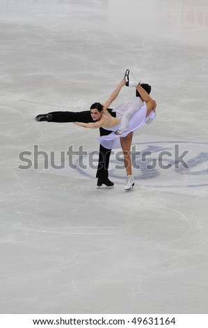 TURIN, ITALY - MARCH 26: Professional Canadian skaters Tessa VIRTUE & Scott MOIR perform free dance during the 2010 World Figure Skating Championship on March 26, 2010 in Turin, Italy.