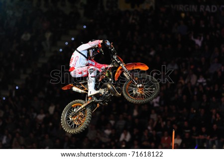 TURIN, ITALY - FEB 20: Max BIANCONCINI (ITA) competes in Maxxis highest air competition during the 2011 IFMX Freestyle motocross world championship on February 20, 2011 in Turin, Italy.