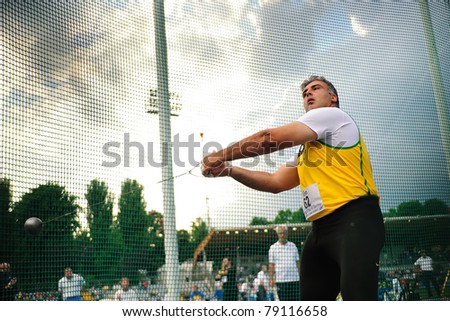 TURIN, ITALY - JUNE 10: Vizzoni Nicola of Italy performs hammer throw during the 2011 Memorial Primo Nebiolo track and field athletics international meeting, on June 10, 2011 in Turin, Italy.