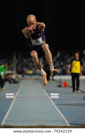 TURIN, ITALY - JUNE 10: Halevi Yochai (ISR) performs triple jump during the 2011 Memorial Primo Nebiolo track and field athletics international meeting, on June 10, 2011 in Turin, Italy.