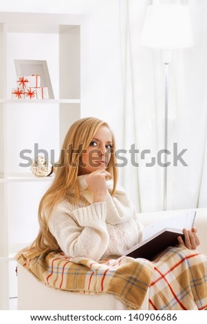 beauty girl reading book in the room