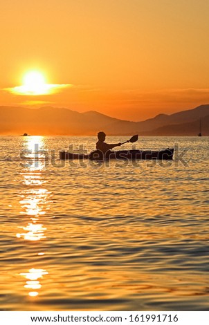 Summer sunset kayaking in Montenegro
