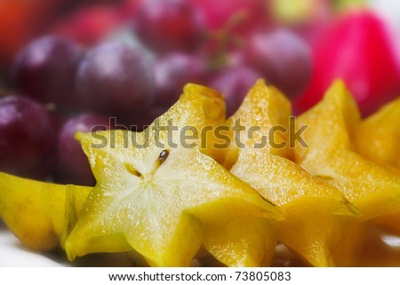 tropical fruits. still life with sliced carambola