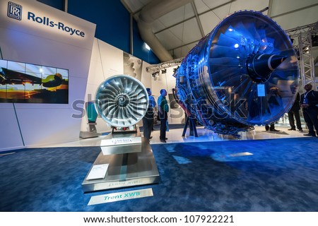 FARNBOROUGH, UK - JULY 12: Exhibition by Rolls-Royce of the latest Trent 1000 jet engine at the Farnborough Airshow, UK on July 12, 2012
