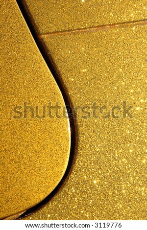 golden glitter paintwork on hot rod automobile hood