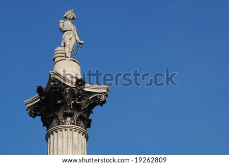 nelsons column in london against a blue sky