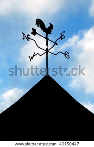 silhouette of a weather vane showing wind direction