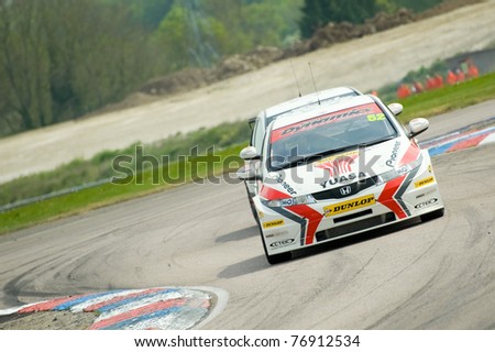 THRUXTON, UNITED KINGDOM - MAY 1: Honda Racing driver Gordon Shedden with team-mate Matt Neal in his slipstream at the British Touring Car Championships on May 1, 2011 in Thruxton, UK.