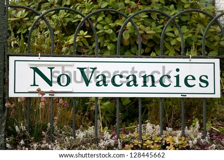 Green No Vacancies Sign in Rural Setting