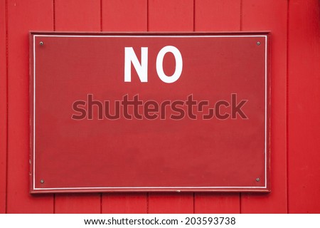 Red and White No Sign on Garage Door with Copy Space