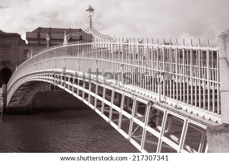 Ha\'penny Bridge, River Liffey, Dublin; Ireland in Black and White Sepia Tone