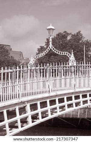 Ha\'penny Bridge, River Liffey, Dublin; Ireland in Black and White Sepia Tone