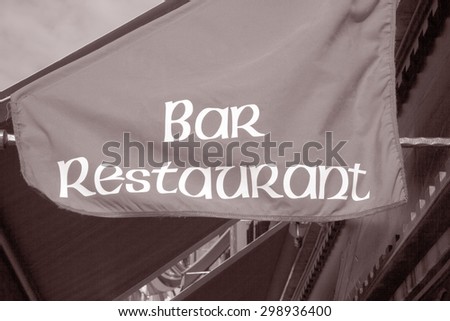 Restaurant and Bar Sign in Black and White Sepia Tone