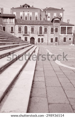 Steps in front of Santa Maria della Salute Church, Venice, Italy in Black and White Sepia Tone