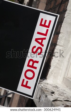 For Sale Sign outside Real Estate Property