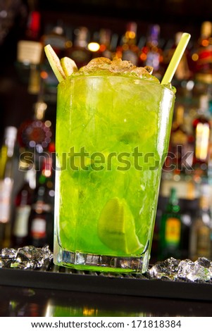 Green apple cocktail on the bar counter