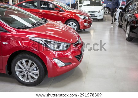 ST. PETERSBURG, RUSSIA - CIRCA APR, 2015: The Hyundai dealership showroom with entry models of vehicles. The Rolf Lahta is a official dealer of Hyundai