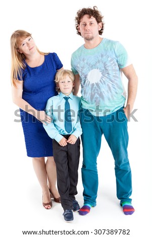 Mom and Dad with son schooler looking at camera, isolated on white background