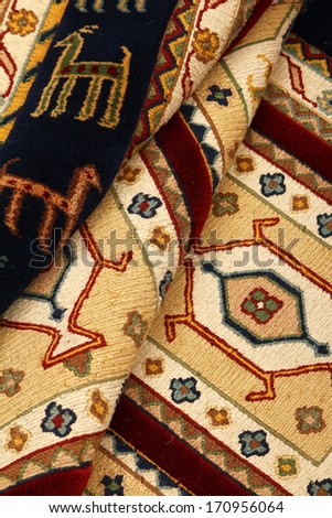 Woolen carpet of handwork on a white background