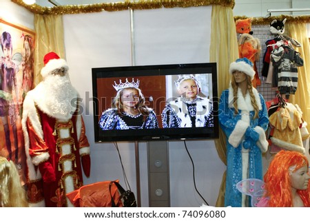 MOSCOW - MARCH 16: Santa Claus, Snow Maiden, the prince and the princess suits presented at the International Toy Specialized Exhibition March 16, 2011 in Moscow