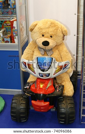 MOSCOW - MARCH 16: Bear on bike presented at the International Toy Specialized Exhibition March 16, 2011 in Moscow