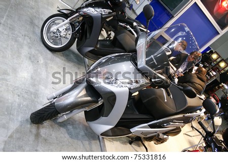 MOSCOW - APRIL 1: Peugeot Geopolis electric scooter motorbike at the Moscow specialized Exhibition  of motor cycling industry in Russia on April 1, 2011 in Moscow, Russia
